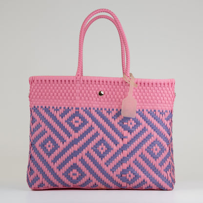 Sac à main motif aztèque en taille médium rose et lilas sur fond blanc 