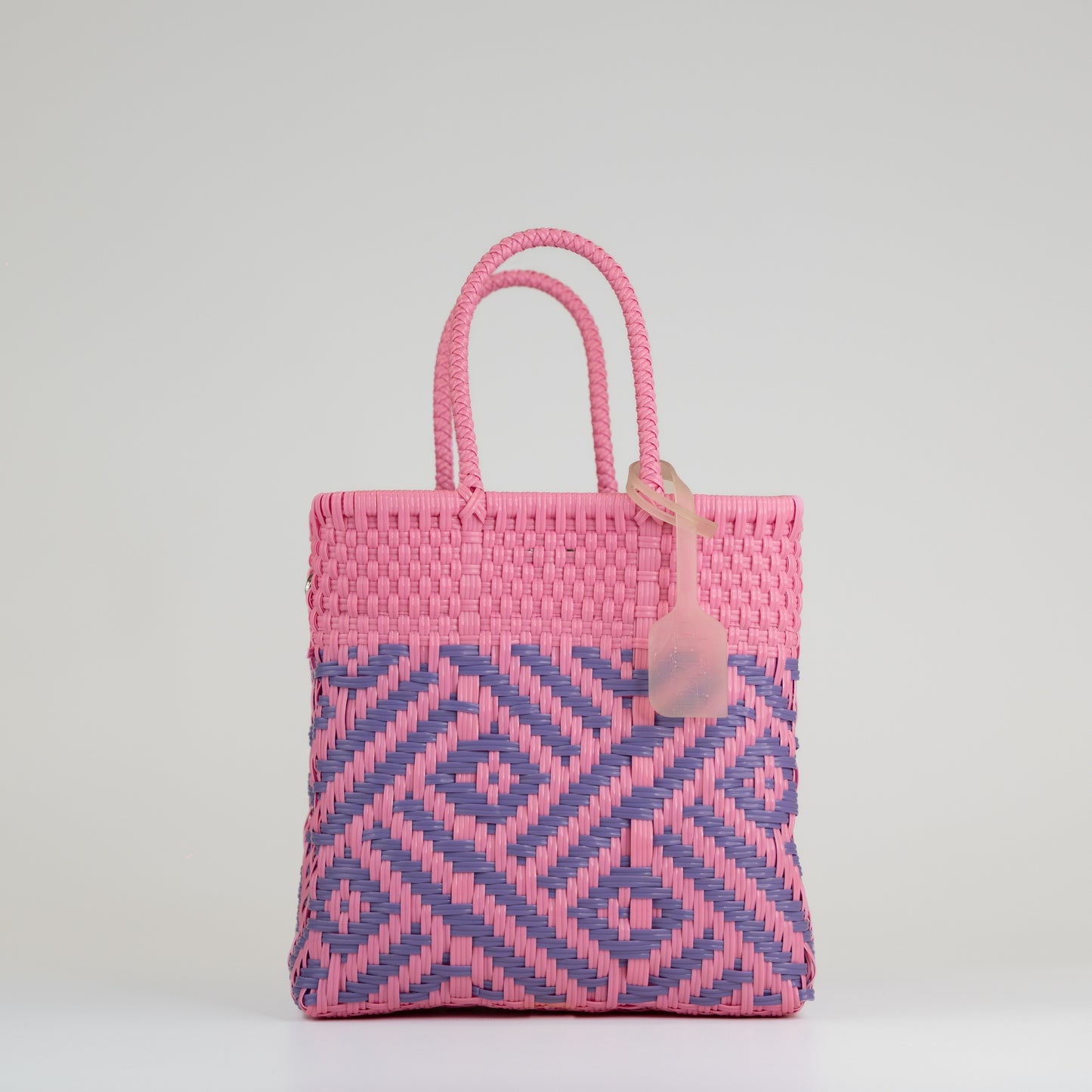 Sac à main motif aztèque en taille small rose et lilas sur fond blanc