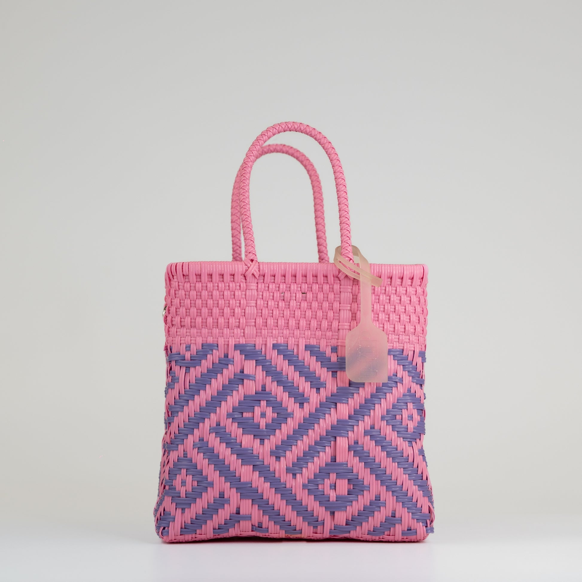 Sac à main motif aztèque en taille small rose et lilas sur fond blanc