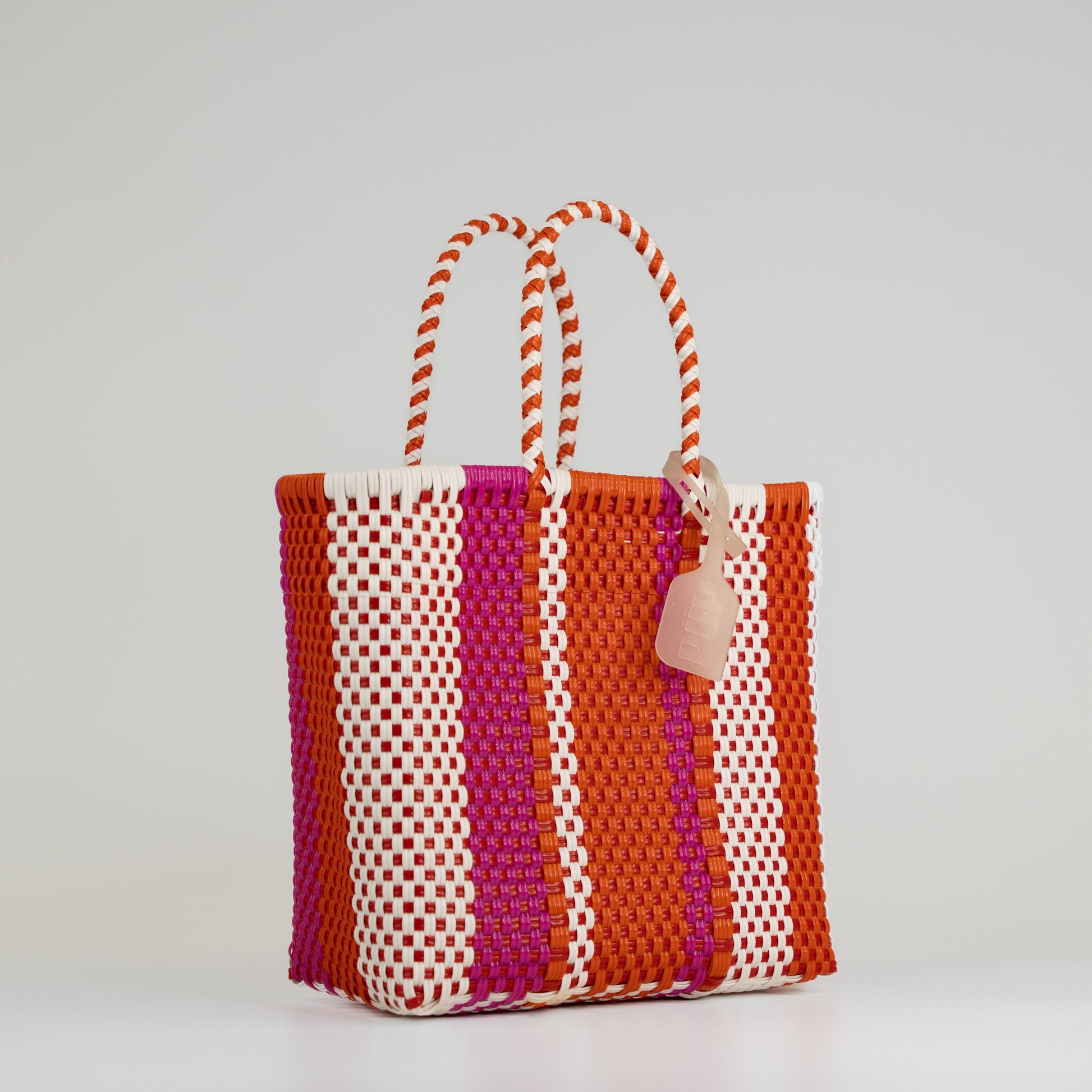 Panier Multi en taille small couleur cerise sur fond blanc