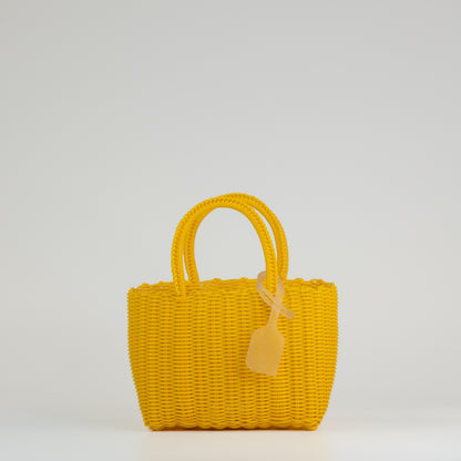 Panier Nëo en taille extra small jaune sur fond blanc 