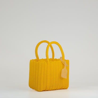 Panier Nëo en taille extra small jaune sur fond blanc 