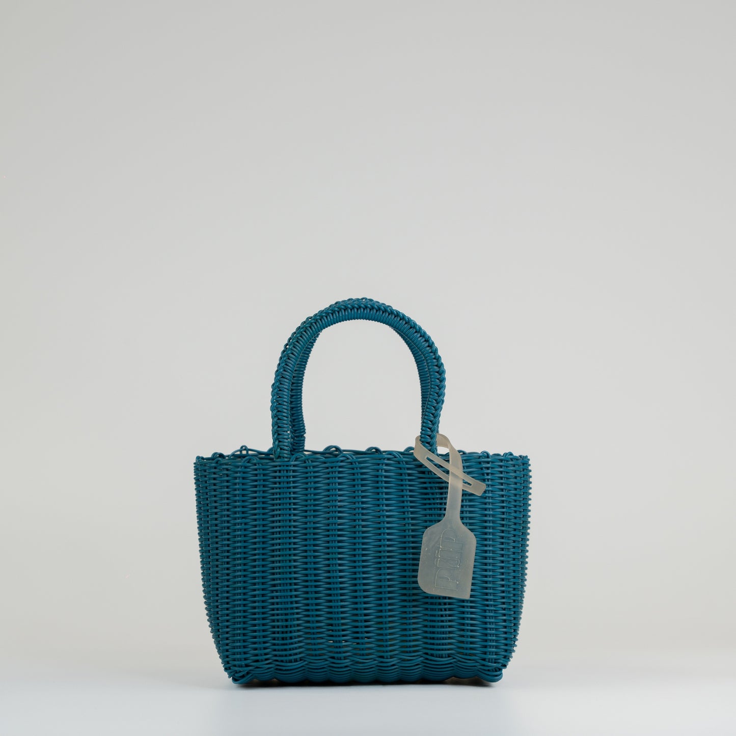 Panier Nëo en taille extra small bleu sur fond blanc 