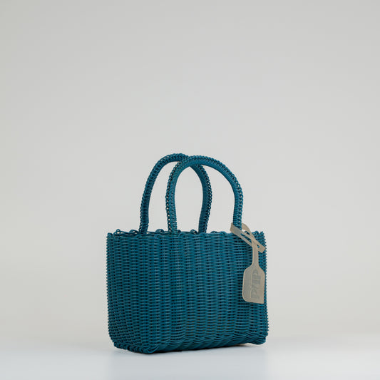 Panier Nëo en taille extra small bleu sur fond blanc 