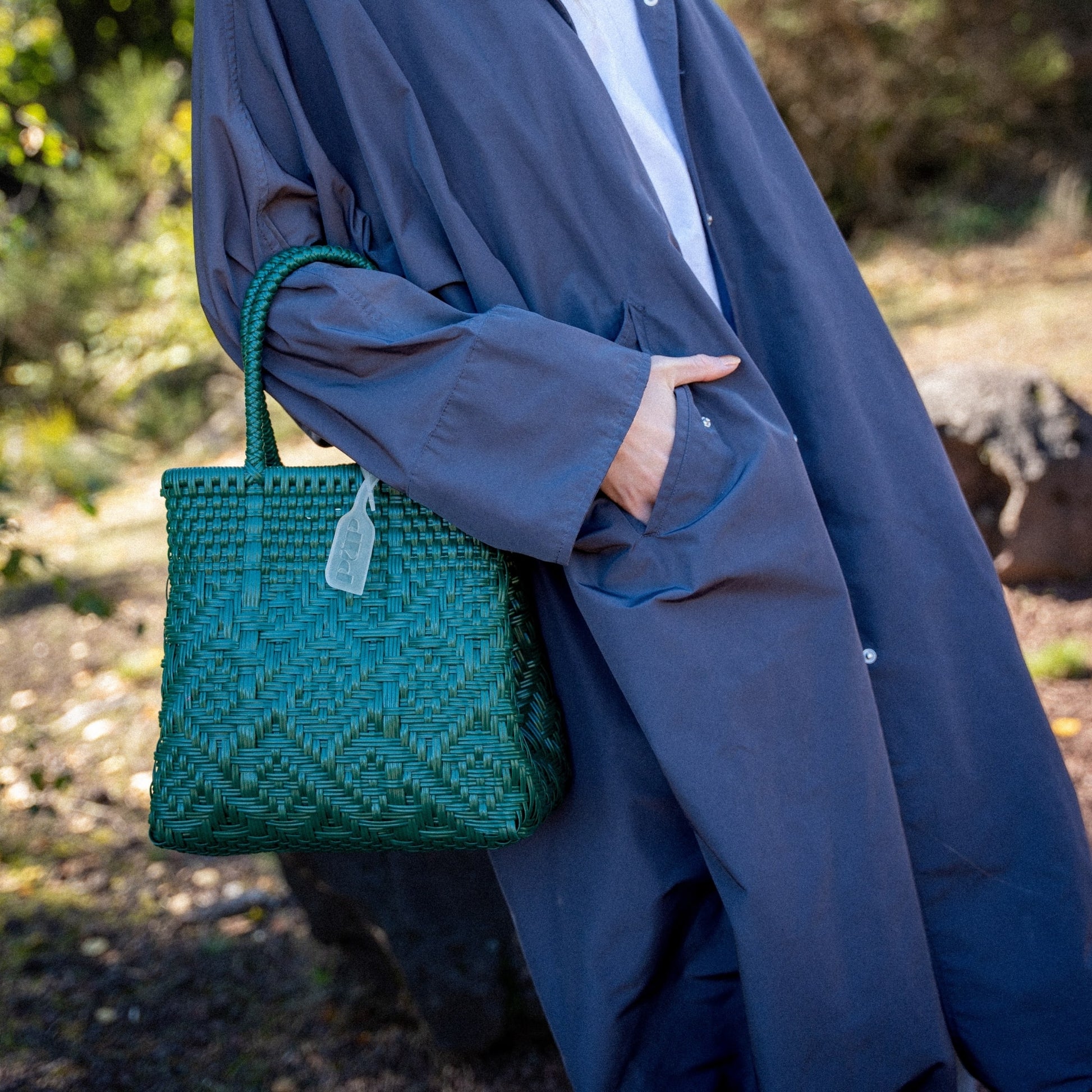 Le sac à main Loom S en coloris Jade